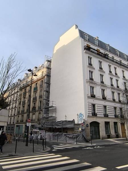Isolation thermique des murs par l'extérieur en laine de roche à Paris sur ce pignon