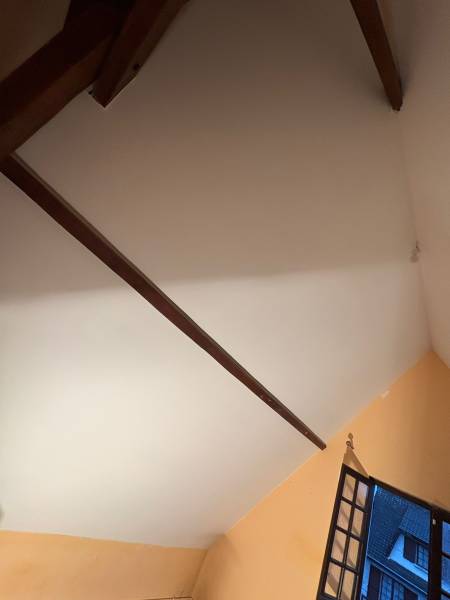 Isolation thermique des rampants de toiture par l'intérieur en double couche de laine de roche