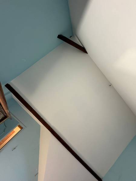 Isolation thermique des rampants de toiture par l'intérieur en double couche de laine de roche